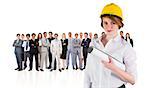 Composite image of pretty young architect smiling at camera against group of workers