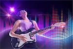 Pretty girl playing guitar against digitally generated disco light design