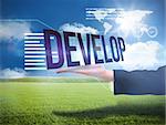 Businesswomans hand presenting the word develop against sunny green landscape