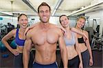 Handsome instructor is popular with the ladies at the gym