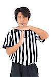 Stern referee showing time out sign on white background