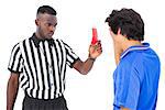 Referee sending off football player on white background