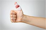 Injured finger with bloody gauze bandage