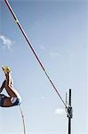 Pole vaulter nearing bar