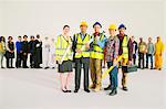 Portrait of confident construction workers