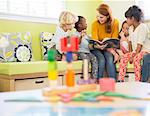 Teacher and students reading in classroom