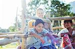 Teacher and students playing on play structure