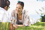 Couple drinking champagne outdoors