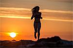 Young Girl Running On A Pier