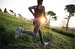 Young Girl Running In A Park