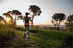 Young Girl Running In A Park