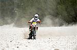 Man Riding Enduro Bike on Stony Trail