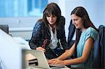 Businesswomen working on laptop