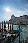 Gondolas on Grand Canal with a view of the church of Santa Maria Della Salute, Venice, Veneto, Italy