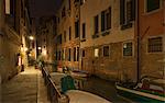 Boats on canal at night, Venice, Veneto, Italy