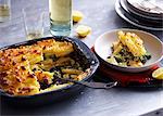 Baking tin and bowl serving of pasticcio