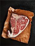 Porterhouse steak on a piece of paper