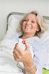 Patient in hospital ringing for nurse