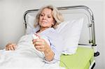 Patient in hospital ringing for nurse