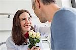 husband calling on sick wife in hosptal