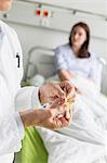 Doctor preparing infusion needle