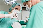 Surgeons performing operation