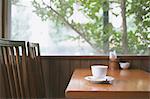 Coffee on wooden table in a cafe