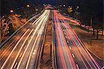 Storrow Drive with car lights at dawn in Boston, Massachusetts, USA