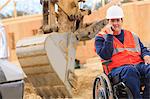 Construction engineer with spinal cord injury on radio to equipment operator