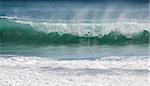 Big ocean wave breaking the shore
