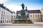 VIENNA, AUSTRIA - AUGUST 4, 2013: Hofburg Palace courtyard with Emperor Franz I sculpture monument, Vienna, Austria.