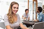 Pretty blonde using her laptop at the coffee shop