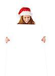 Festive redhead smiling at camera holding poster on white background