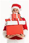 Woman smiling with christmas presents on white background