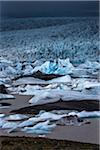 View of glacial ice in lake, Fjallsarlon Glacier, Iceland