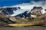 Scenic view of mountainside and glacier, Kviamyrarkambur, Iceland