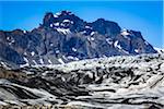 Close-up of glacier with mountains in background, Skaftafellsjokull, Skaftafell National Park, Iceland