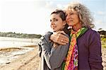 Mother and daughter enjoying beach