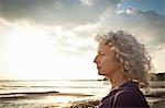 Mature woman enjoying beach