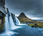 Kirkjufellsfoss waterfall, Mt. Kikjufell in background, Snaefellsnes, Iceland