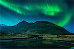 Aurora Borealis above Kirkjufellsfoss waterfall, Grundarfjordur, Snaefellsnes, Iceland