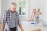 Older couple observing new living space