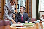 Lawyers doing research together in chambers