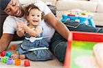 Father playing with young daughter