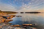 Rocky coast at dusk, Djuro National Park, Sweden