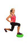 Young woman exercising, studio shot