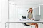 Young woman at desk