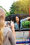 Young woman in rickshaw, Bangkok, Thailand