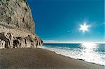 Beautiful sunny day landscape,blue sea and old wall