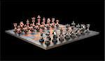 Chessboard with pieces of metal. Clipping path included.